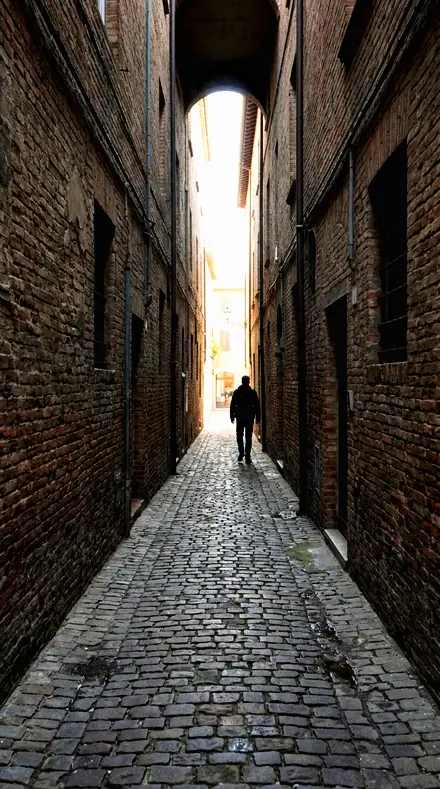 Graded with Film Archive: Bypass silver, the alley stripped to an orange trace